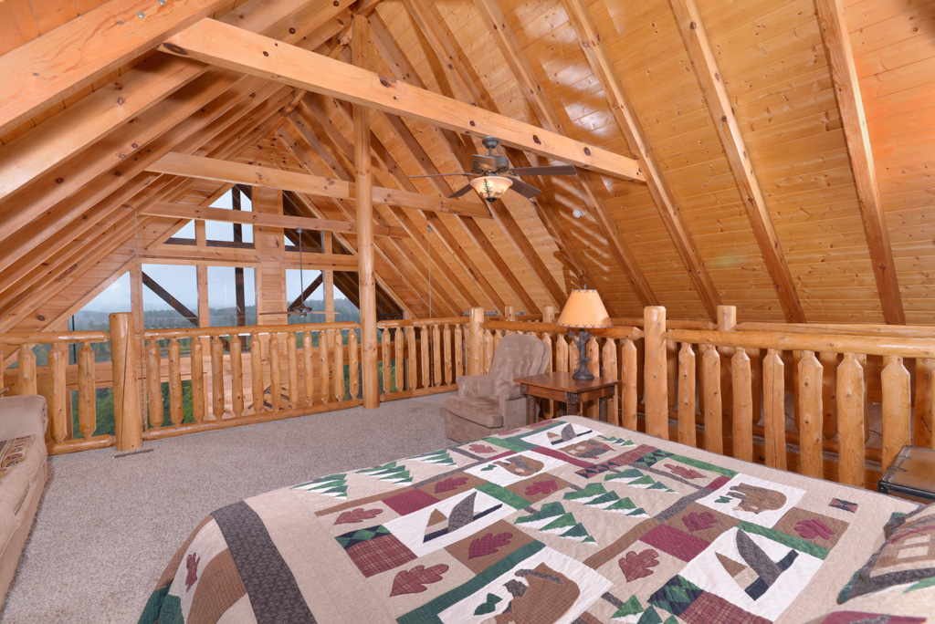 Pigeon Forge Luxury Cabin large loft area with a panoramic mountain view
